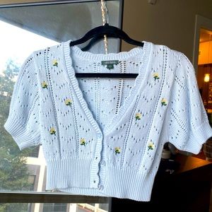 Cropped short sleeve knit cardigan in baby blue